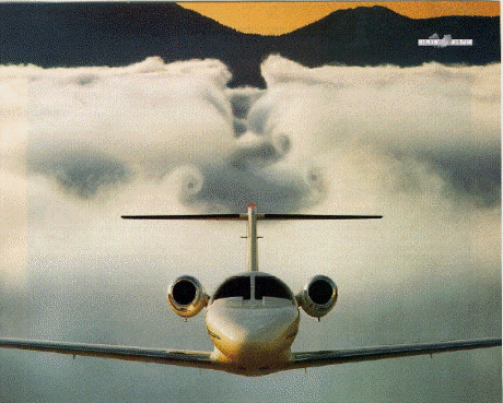 Photo of a jet passing through clouds to illustrate the movement of air over wingtips